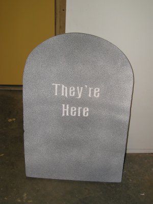 A re-carved store-bought gravestone before re-painting.