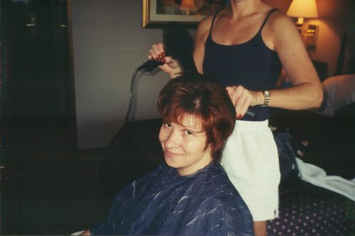 Lynnell blow-drying Kim's hair.